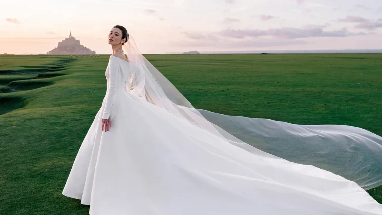 Model Ming Xi Wore Jonathan Anderson’s First-Ever Custom Dior Wedding Dress to Marry at Mont Saint-Michel Model Ming Xi Wore Jonathan Anderson’s First-Ever Custom Dior Wedding Dress to Marry at Mont Saint-Michel